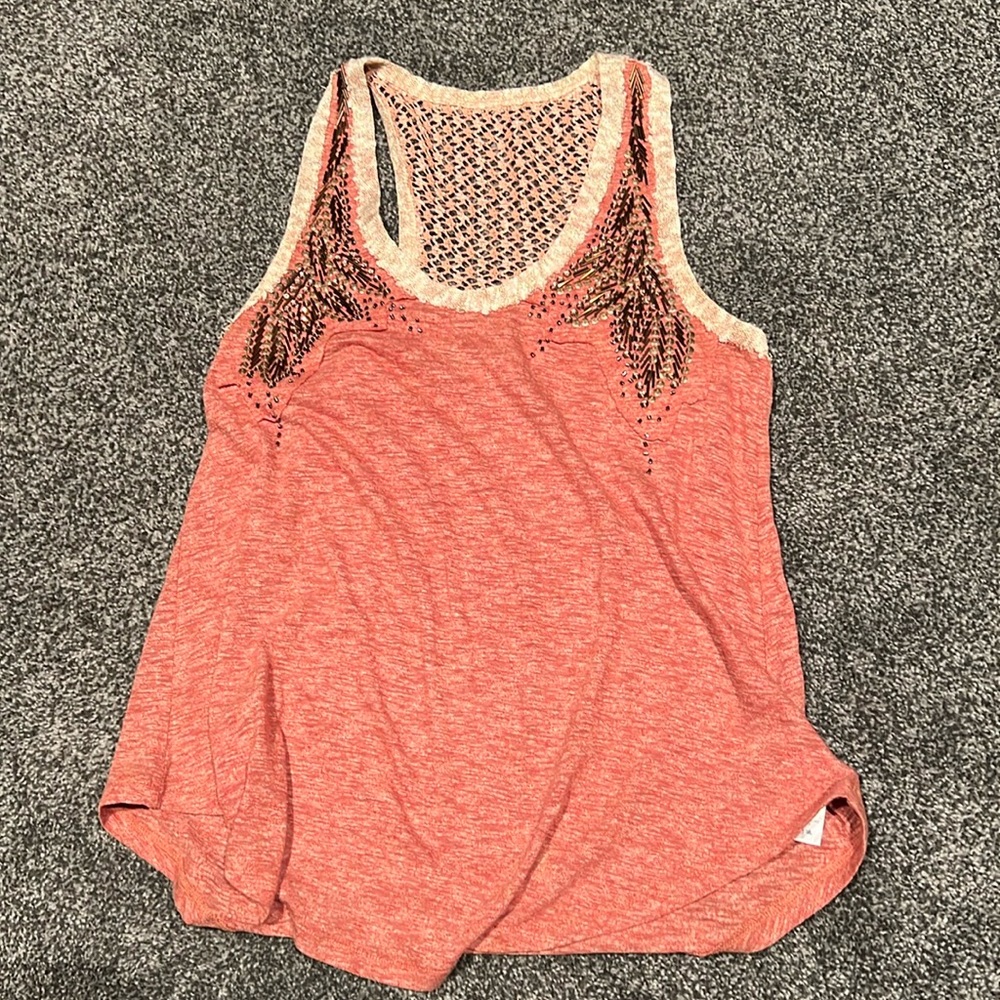 Adorable tank great for all seasons. Awesome beadwork and lace back